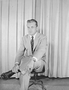 A third publicity portrait from the same session.